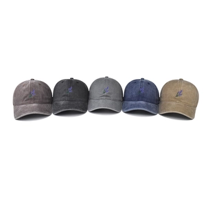 Washed cotton baseball caps with lavender embroidery in various vintage colors