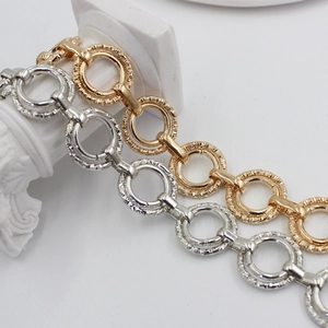 Adjustable metal waist chain for dresses featuring gold and silver hammered ring textures