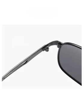 Close-up of durable metal hinge structure on polarized photochromic sunglasses