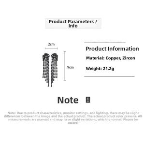 Detail showing measurements of black tassel drop earrings with zircon in 9cm length