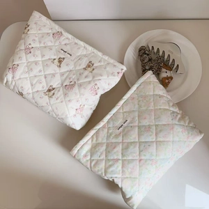Quilted cotton cosmetic bags with cute teddy bear and floral prints and logo patch