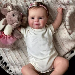 Realistic 50cm full silicone baby doll Maddie with pink headband and plush mouse toy