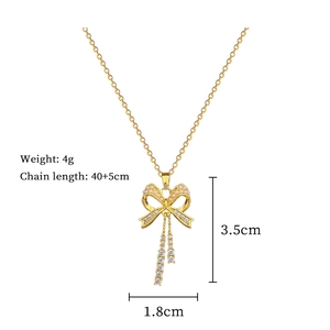 Detailed size map of gold bow necklace with pearls and rhinestones 40cm chain
