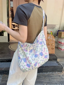 Floral canvas tote bag for women with purple floral print and large capacity design