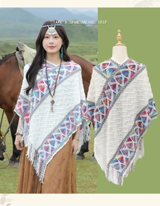 Ethnic knit poncho with geometric patterns and fringe detail for outdoor travel wear