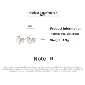 Detailed view of silver C-shape tassel earrings with white pearls and 3.5cm size specs
