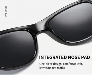 Detailed close-up of integrated nose pads on black glossy retro-style sunglasses