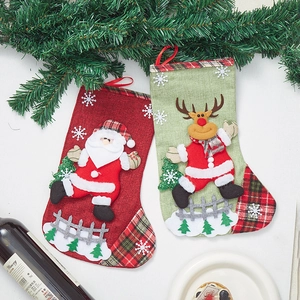 Red Santa and green Reindeer burlap Christmas stockings with snowflakes and hanger