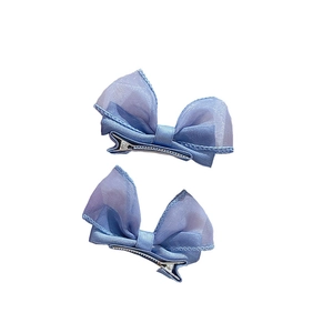 Pair of elegant blue mesh bow hair clips for girls with princess style aesthetic