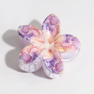 Elegant marble-patterned lily hair claw clip with golden sand details for women