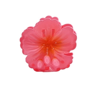 Pink camellia flower hair claw clip with detailed petals on white background