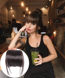 Detailed view of dark brown air bangs with sideburns made of heat resistant hair fiber