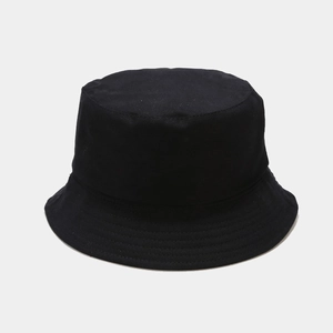 Detailed close-up showing the premium cotton fabric texture of this black bucket hat
