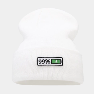 Close-up of white knitted beanie featuring green 99% battery percentage embroidery detail