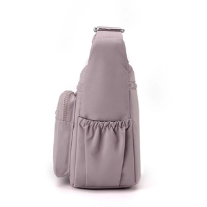 Light purple oxford nylon crossbody bag for women with side pockets and glossy finish