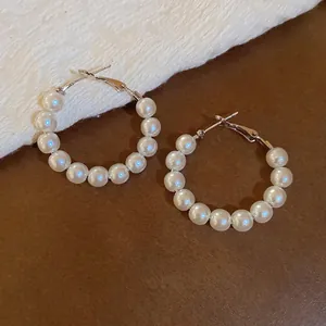 Elegant silver hoop earrings with round white pearls for women's stylish fashion