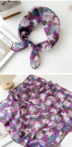 Detailed view of floral cotton linen scarf featuring purple lily patterns and soft silk texture