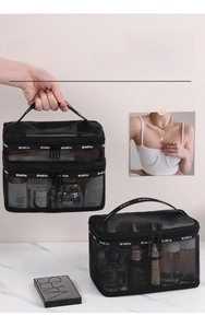 Detail of black mesh makeup bag featuring dual compartments and clear visible storage