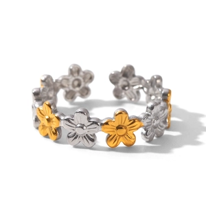 Detail of two-tone stainless steel daisy rings with adjustable open band design