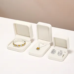 Luxury velvet jewelry gift box set with yellow gemstone necklace, bracelet, and earrings
