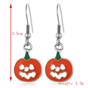 Close-up of Halloween pumpkin earrings showing 3.5cm height and 4.3g weight detail