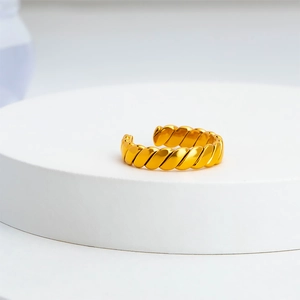 Gold plated croissant ring with minimalist twisted rope design and adjustable open band
