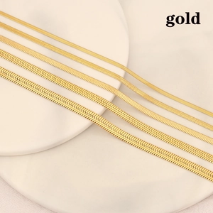Flat gold snake chain necklace set in various widths made of durable stainless steel