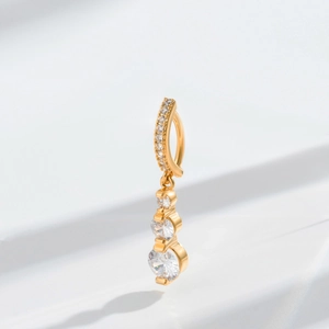 Golden dreamcatcher navel piercing belly ring with three dangling clear zircon stones