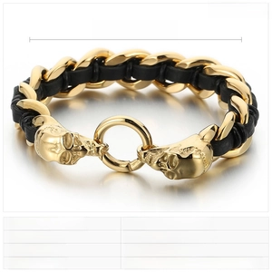 Detailed view of punk skull bracelet made of stainless steel and black braided leather