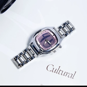 Close-up detail of vintage-style silver alloy watch featuring unique purple airplane dial