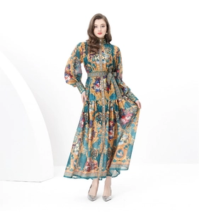 Detail of baroque print dress with stand collar and elegant lantern sleeve design