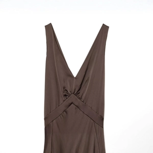 Satin dark chocolate brown sleeveless maxi dress with deep V-neck and seam details