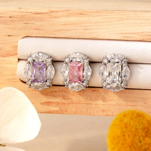Titanium steel screw earrings with cubic zirconia in purple, pink and white colors