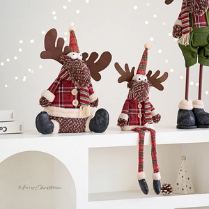 Three Christmas reindeer plush dolls in red plaid fabric with Nordic style decor