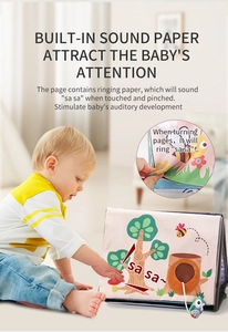 Close-up of baby cloth book with crinkle sound paper and cute nature theme illustrations