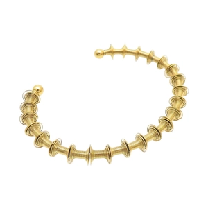 Moderner goldener Spiral-Armreif mit polierten Metallkugeln für Damen und Herren
