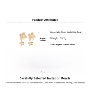 Detail showing irregular gold flower earrings with pearls including size 6.6cm by 4cm