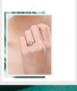 Detailed view of sterling silver ring with three marquise-cut marquise stones in leaf design