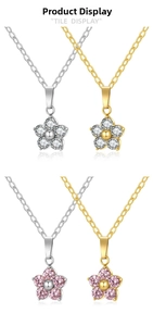 Detail of plum blossom zirconia pendants in gold and silver finish with pink and white gems