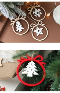 Detail of wooden Christmas ornaments with snowflake patterns and natural jute twine hanging cords