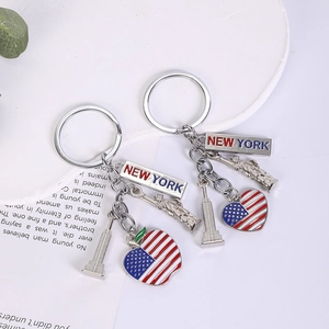 New York souvenir keychains featuring Statue of Liberty, Empire State Building, and US flag