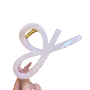 Elegant cream translucent bow hair claw clip with gold metal spring for women