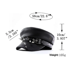 Punk style faux leather navy hat with metal spikes and rivets on a white background