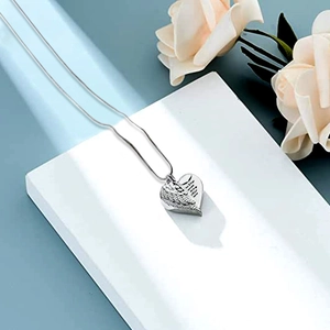Silver heart cremation necklace with angel wing and Always in my heart engraving