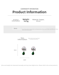 Detail view of retro silver earrings featuring green zircon teardrops and curved metal
