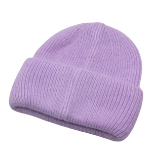 Detailed view of the ribbed texture and wide folded cuff of this purple knitted beanie