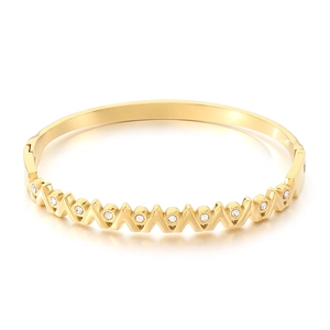 18K gold-plated titanium steel wave bangle with white zircon inlays on white background