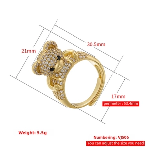Detailed view of gold bear ring with white cubic zirconia and size measurements