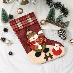 Christmas stocking with 3D snowman and Santa Claus, red plaid and plush festive decor