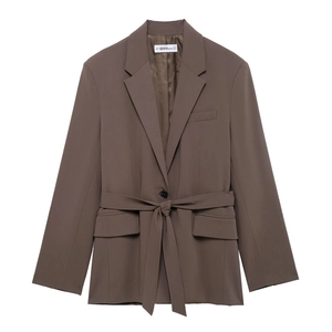 Detailed flat lay of dark brown women blazer featuring belted waist and notched lapel